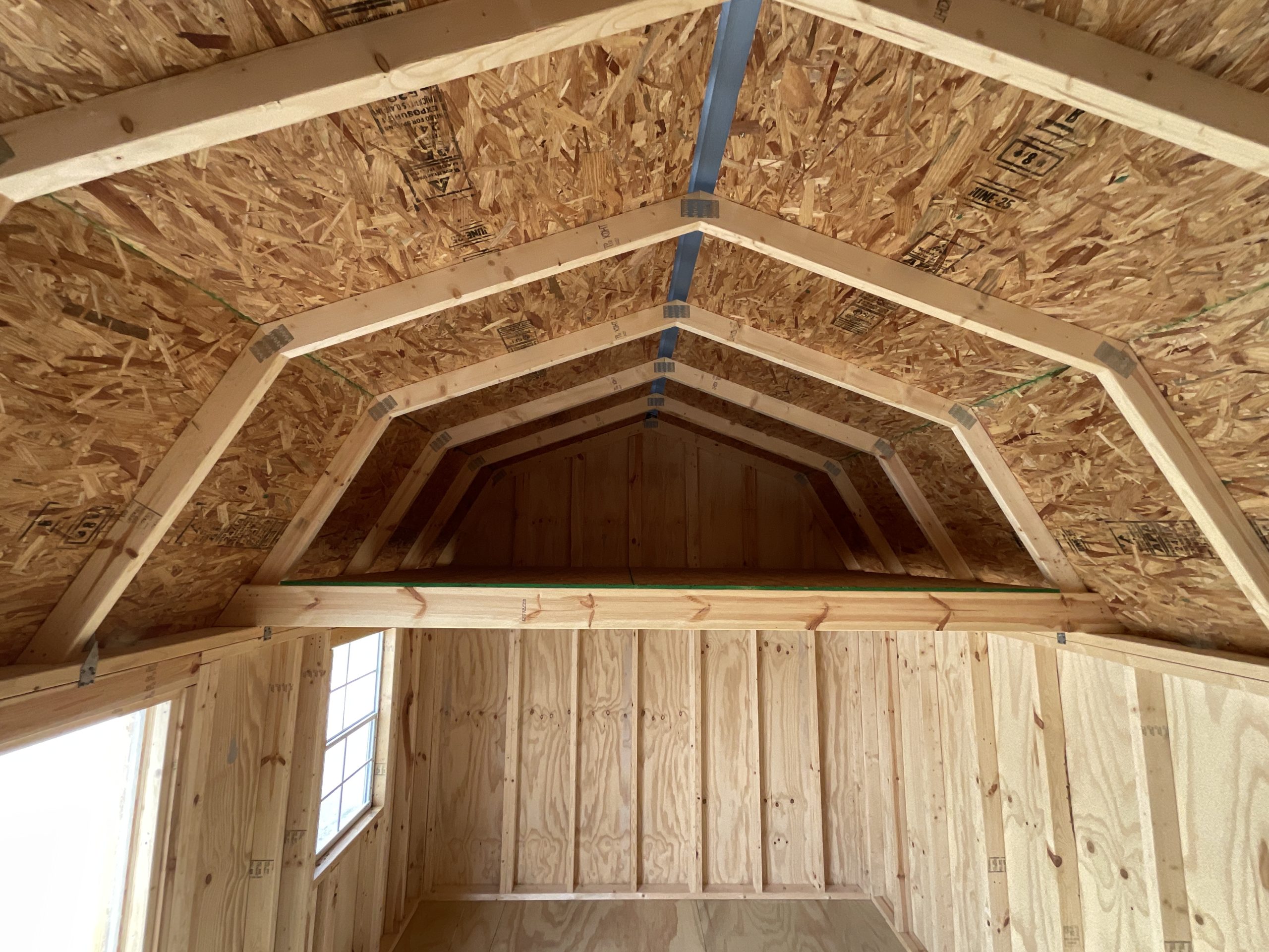 Loft storage area inside 10x20 side lofted barn shed