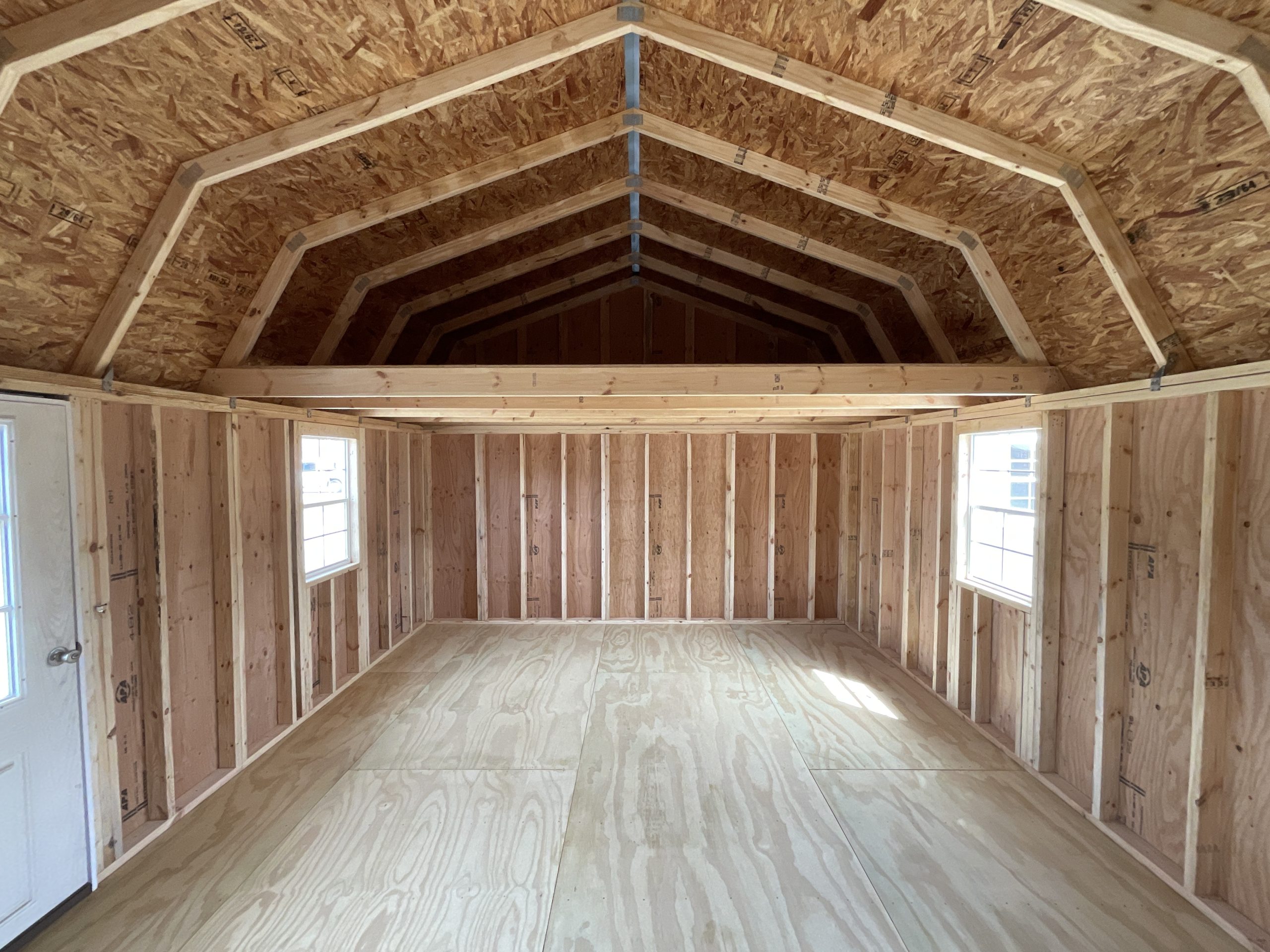 Full interior view of 14x24 lofted barn house shell with lofts Hammond LA