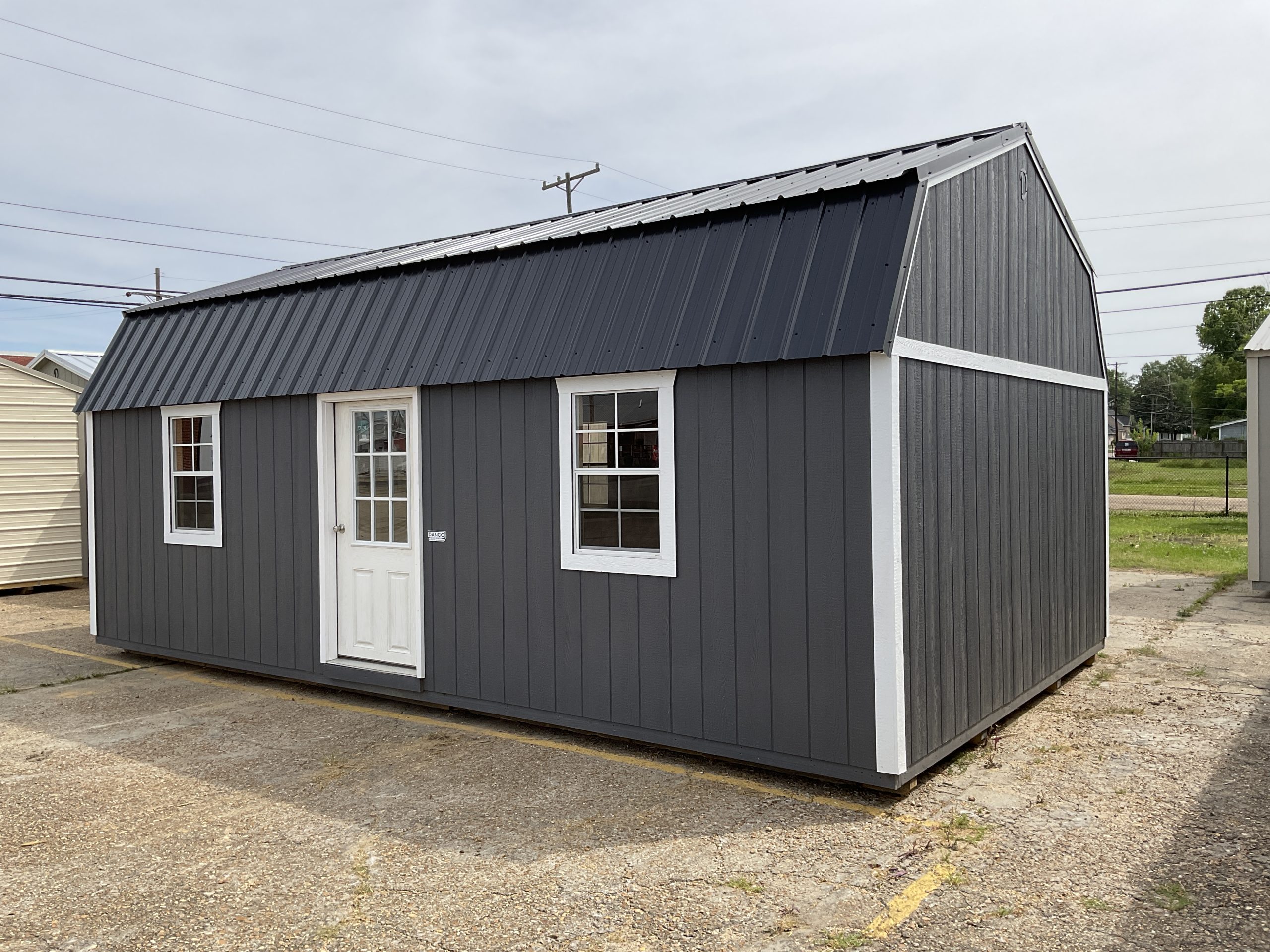 14x24 lofted barn house shell for sale in Hammond LA with metal roof and wood siding