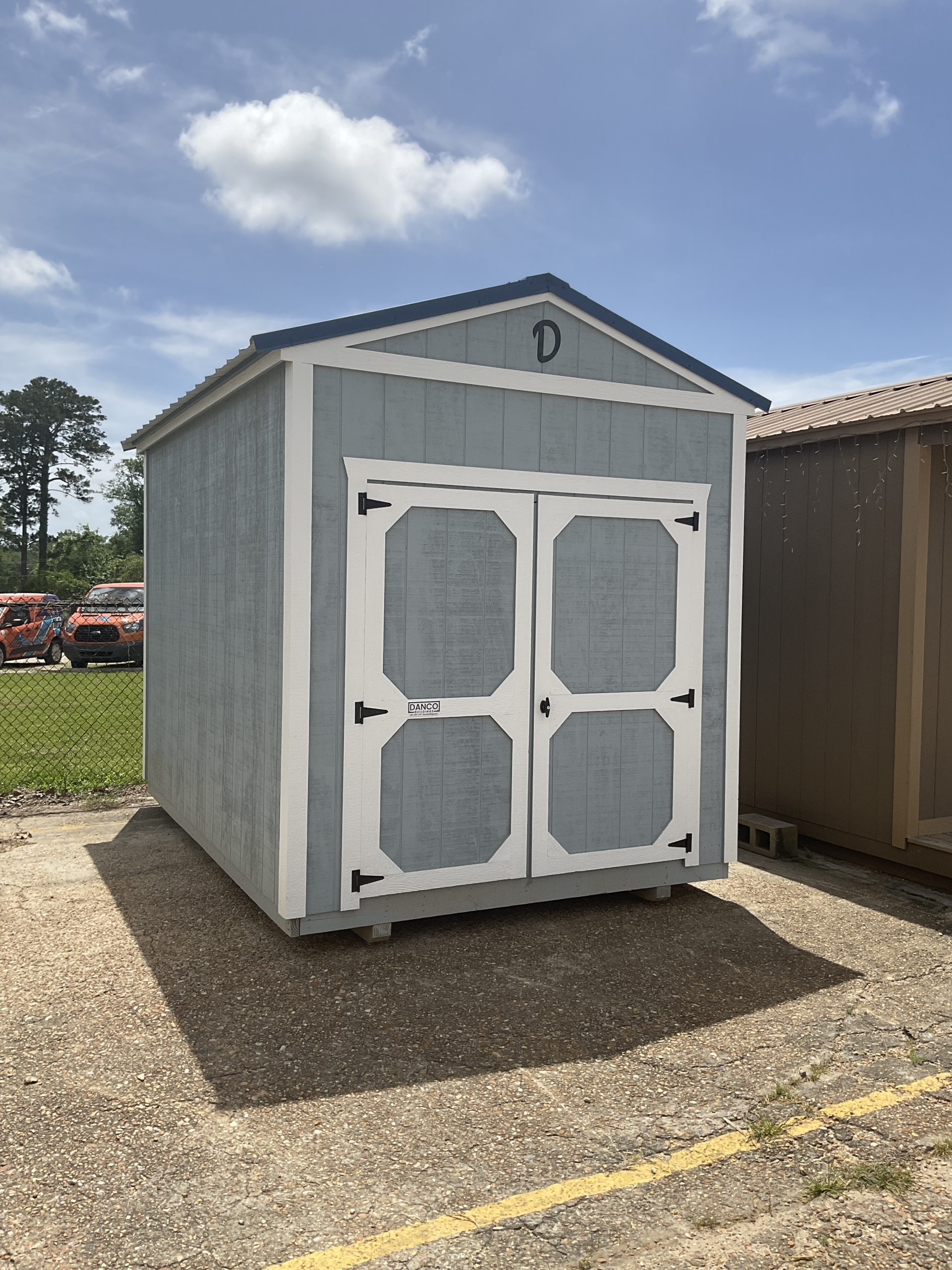 8x12 utility shed for sale in Hammond LA with double doors and blue metal roof