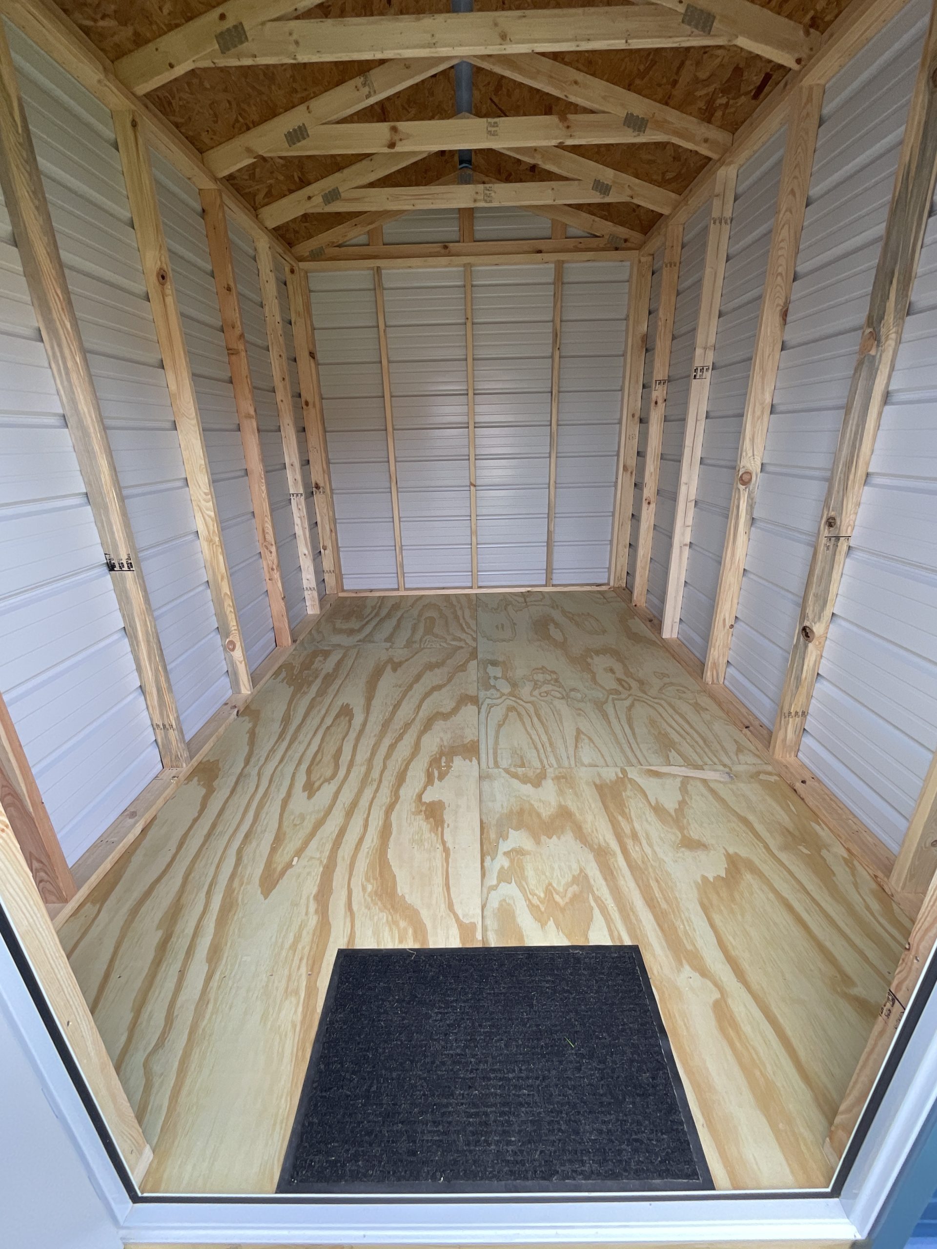 8x12 storage shed interior view from doorway in Hammond LA metal building with wood framing