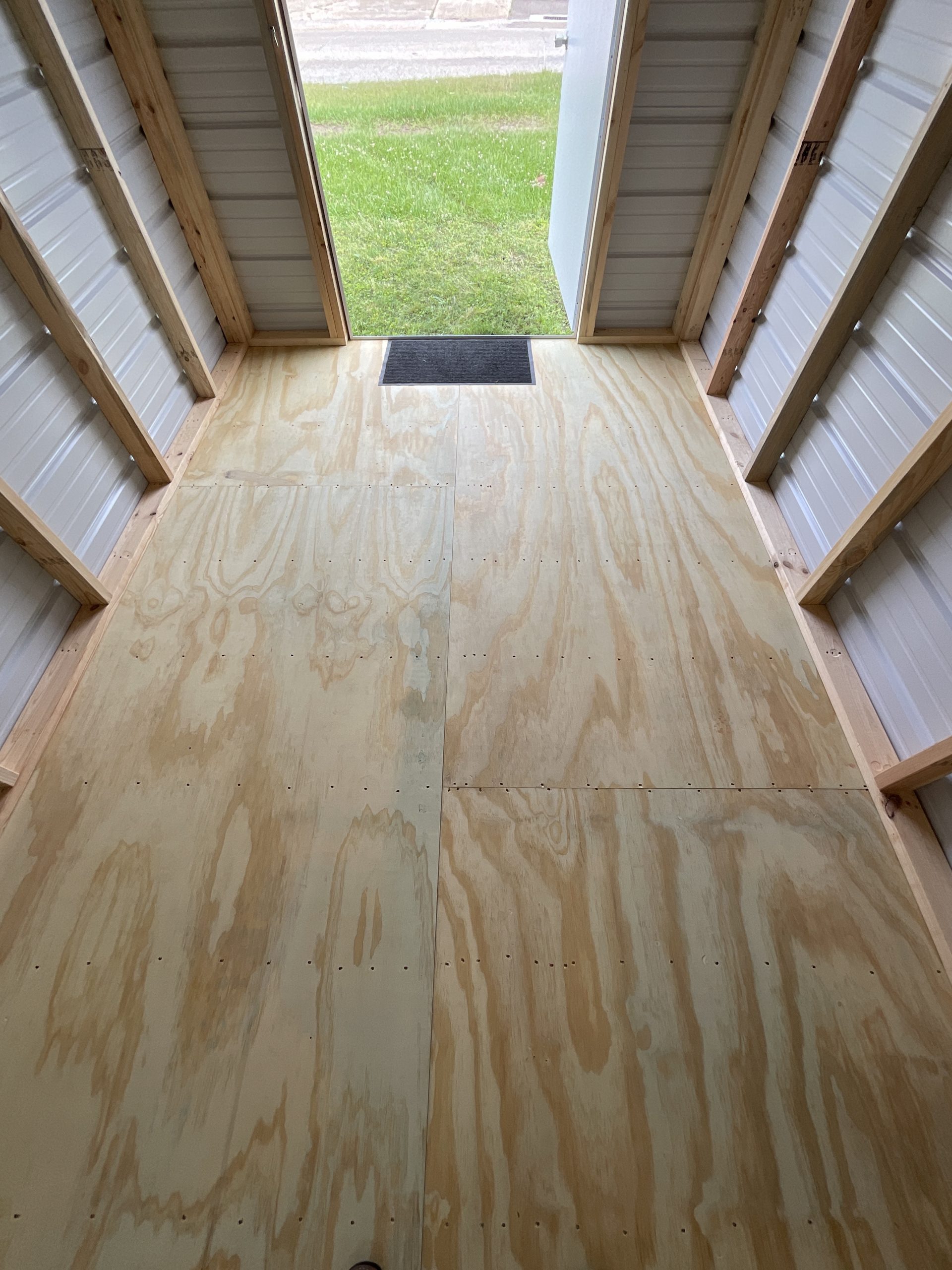 8x12 metal shed interior floor view in Hammond LA showing wood flooring and open doorway