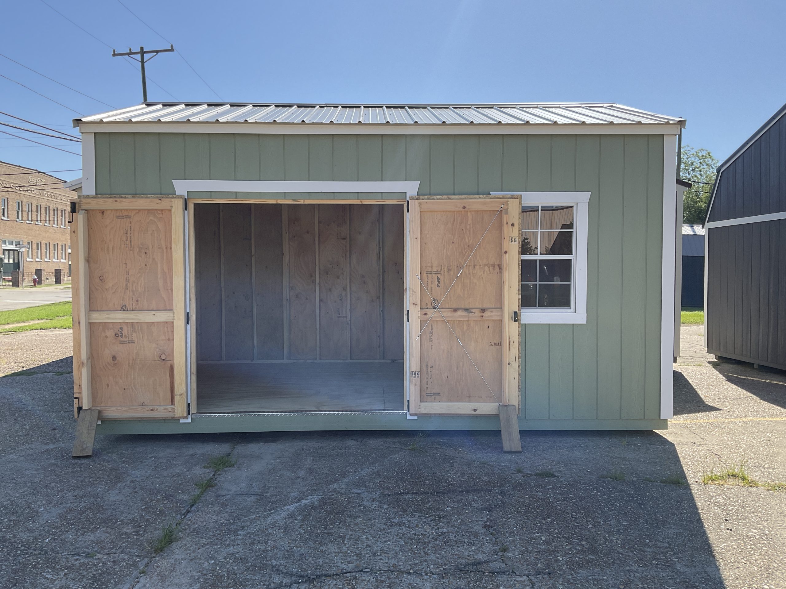 10x16 Garden Shed with Double Wood Doors Open Showing Interior Space