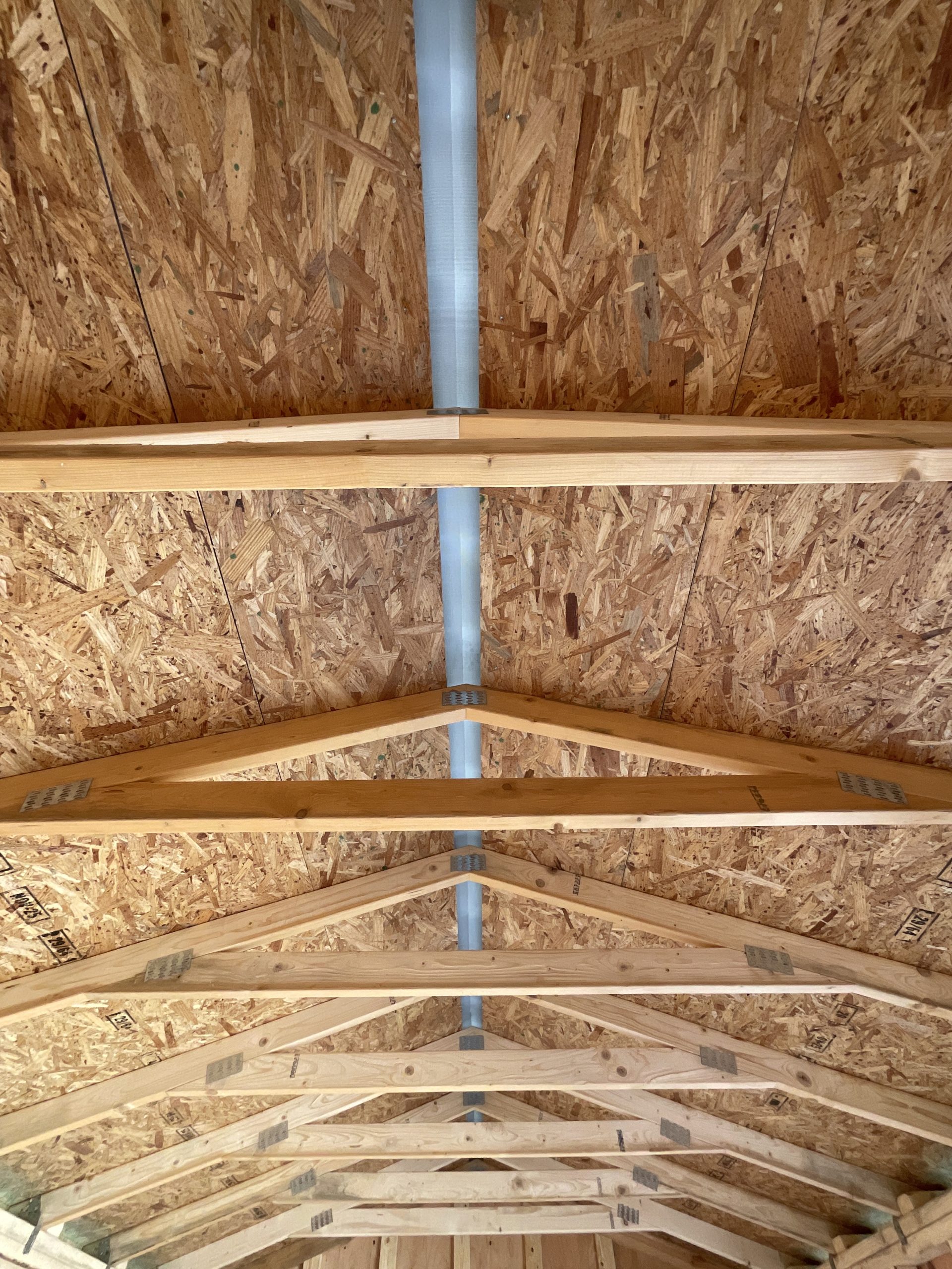 Portable Building Trusses with Full-Length Ridge Cap Vent Opening