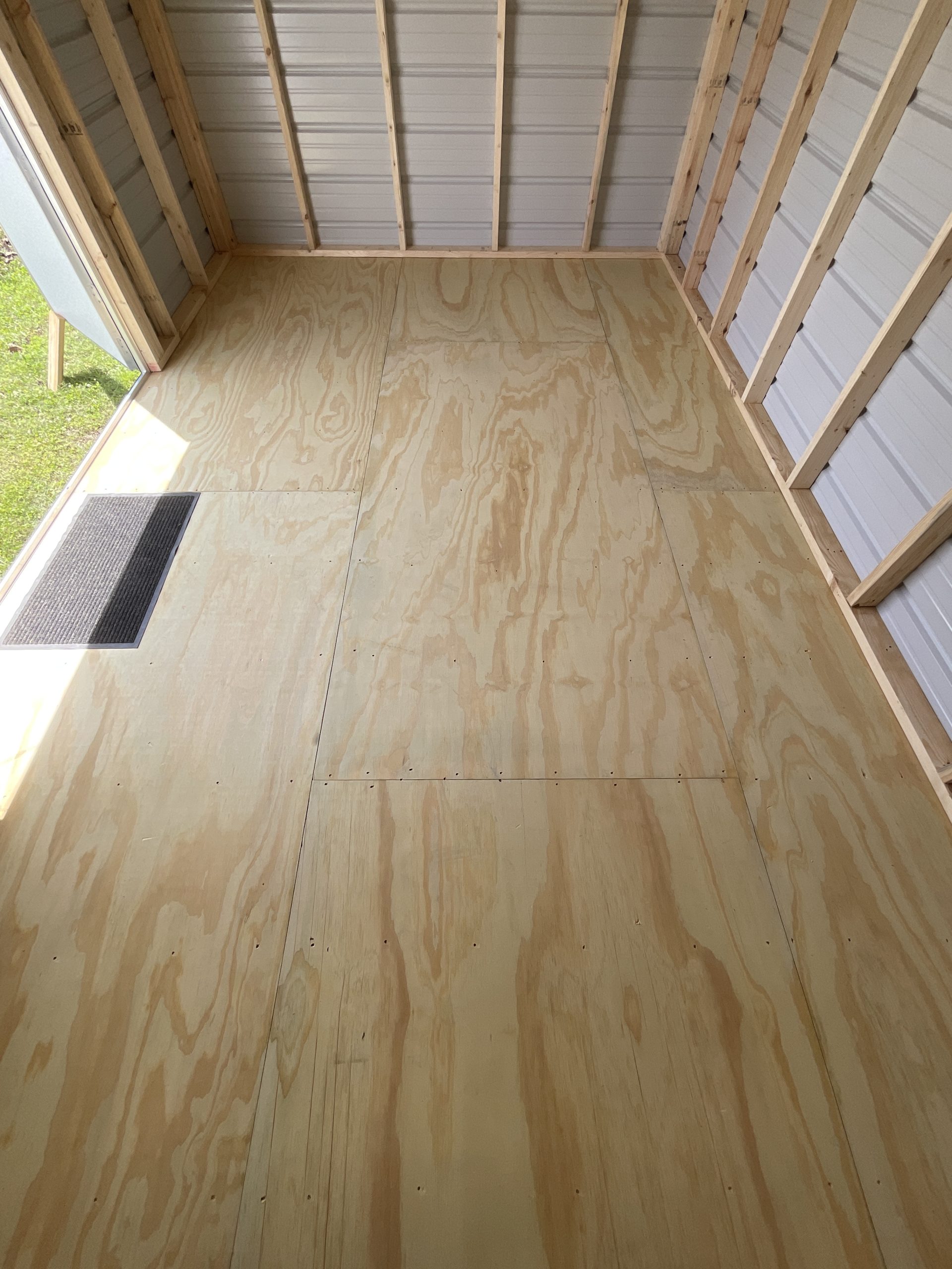 treated wood flooring inside 10x16 shed in Hammond LA