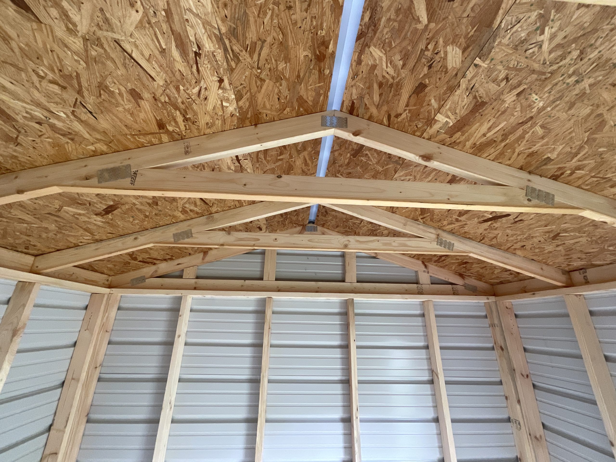 roof trusses and ridge cap vent inside shed Hammond LA