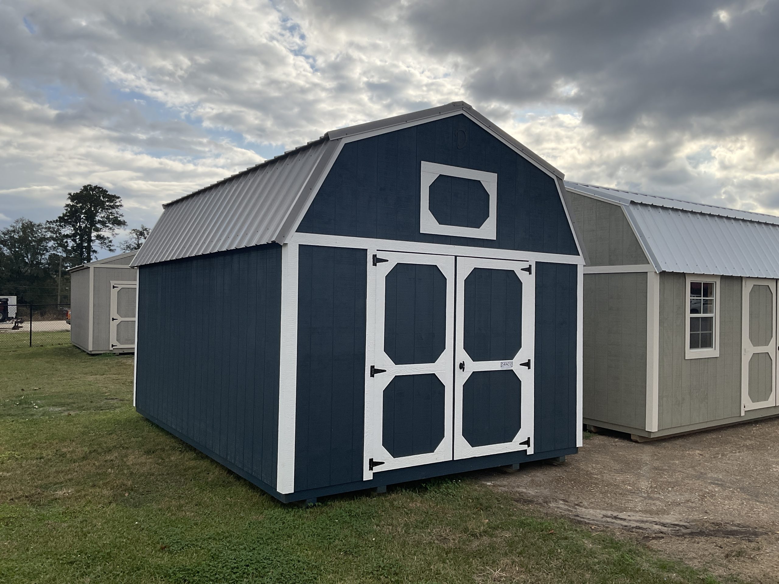 12x16 barn style storage shed with lofts and double wood doors in Hammond LA