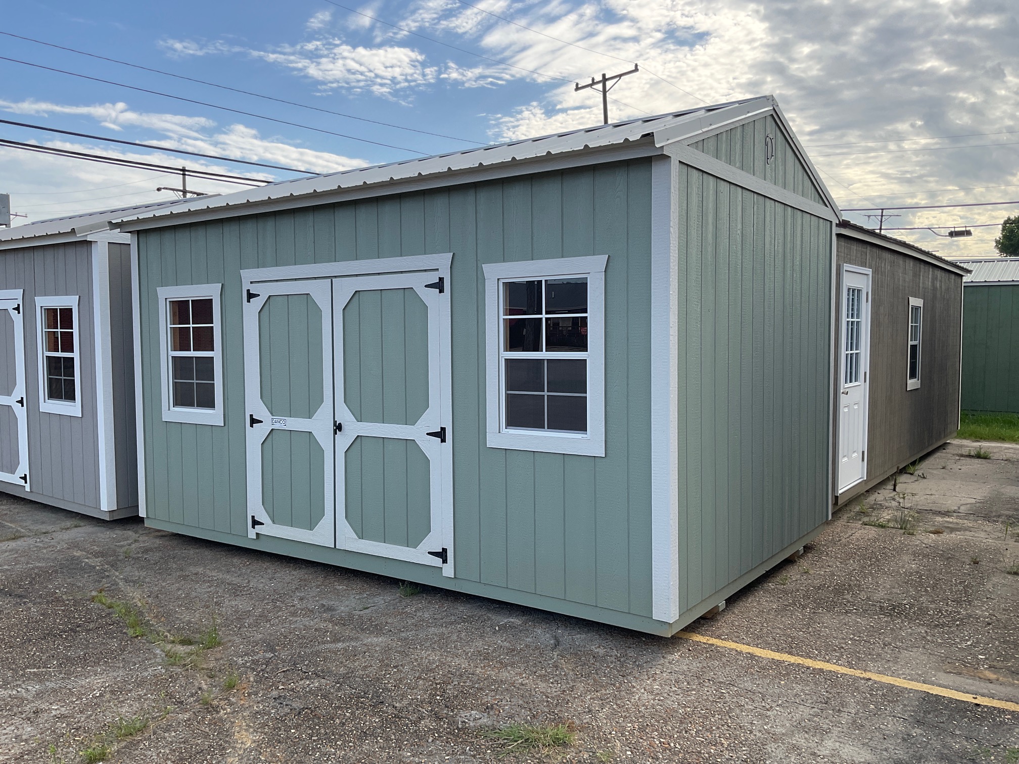 10x16 Premium DuraTemp Garden Shed with double wood doors and two windows in Hammond, Louisiana
