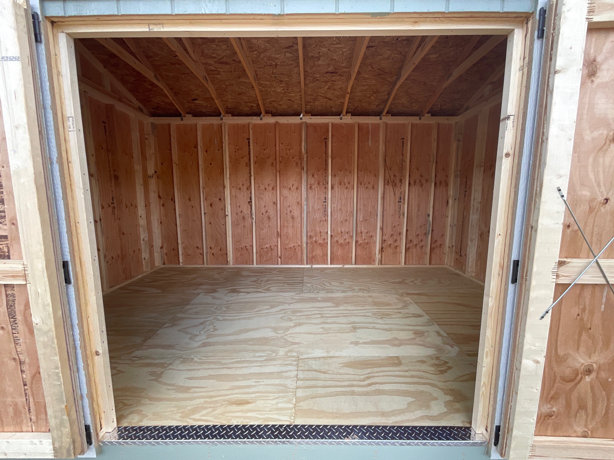 Large open interior of a premium 10x16 portable building.