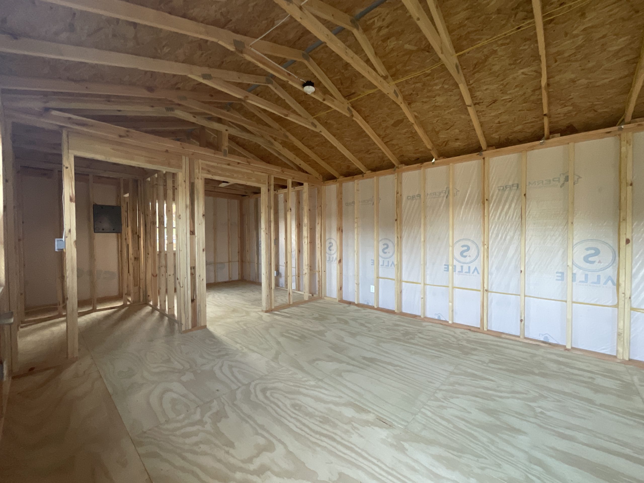 Framed bathroom utility room and secondary bedroom in House Shell
