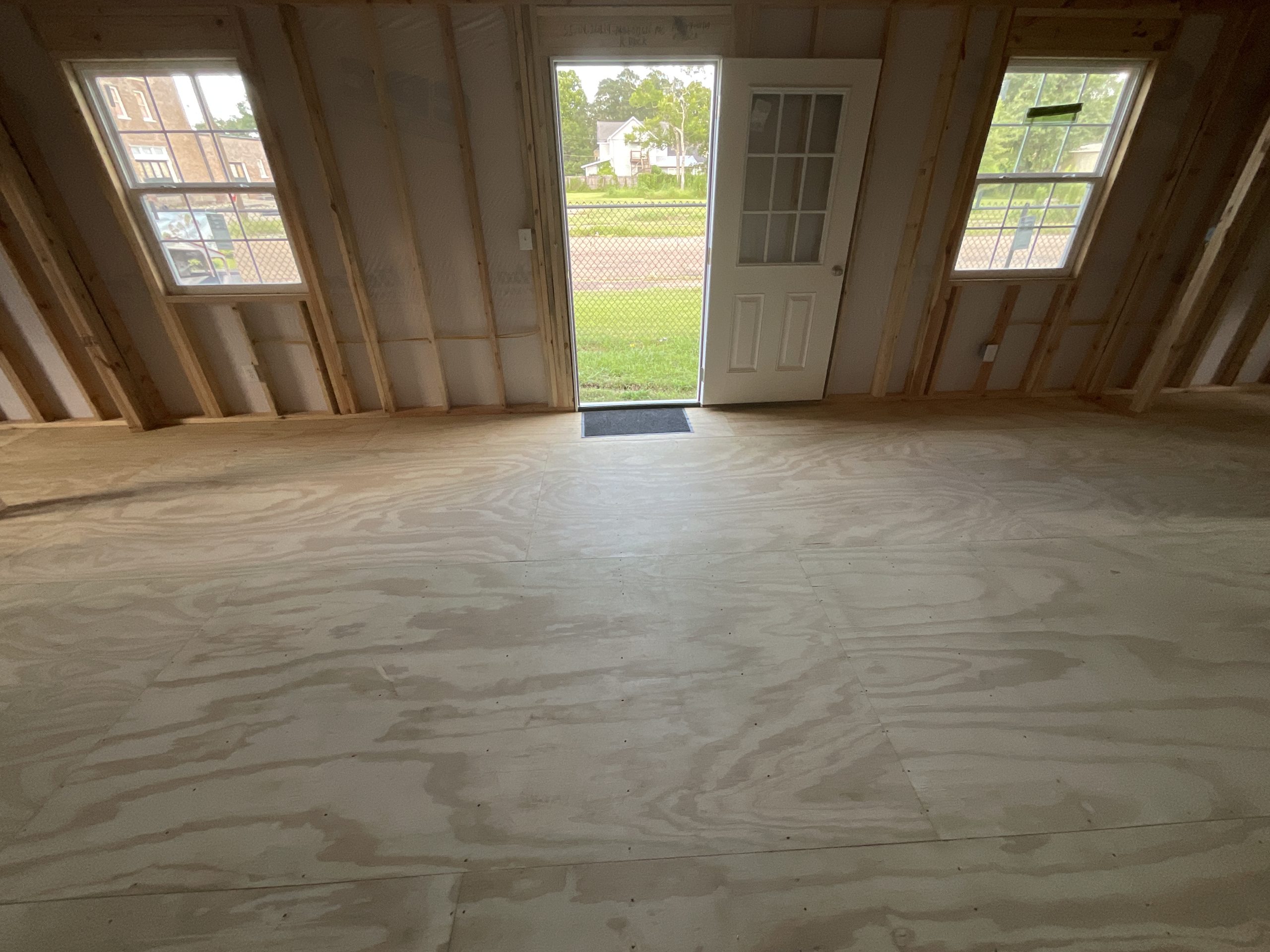 View toward front entry inside House Shell