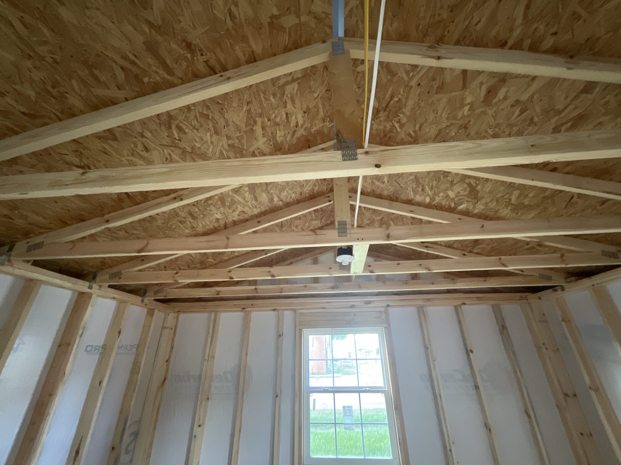 Flat ceiling truss design in primary bedroom