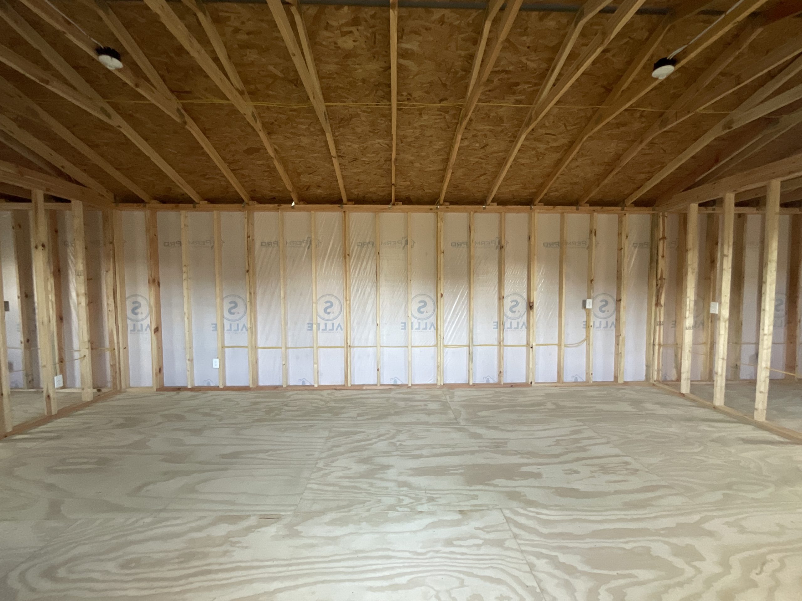 House wrap moisture barrier inside exterior walls