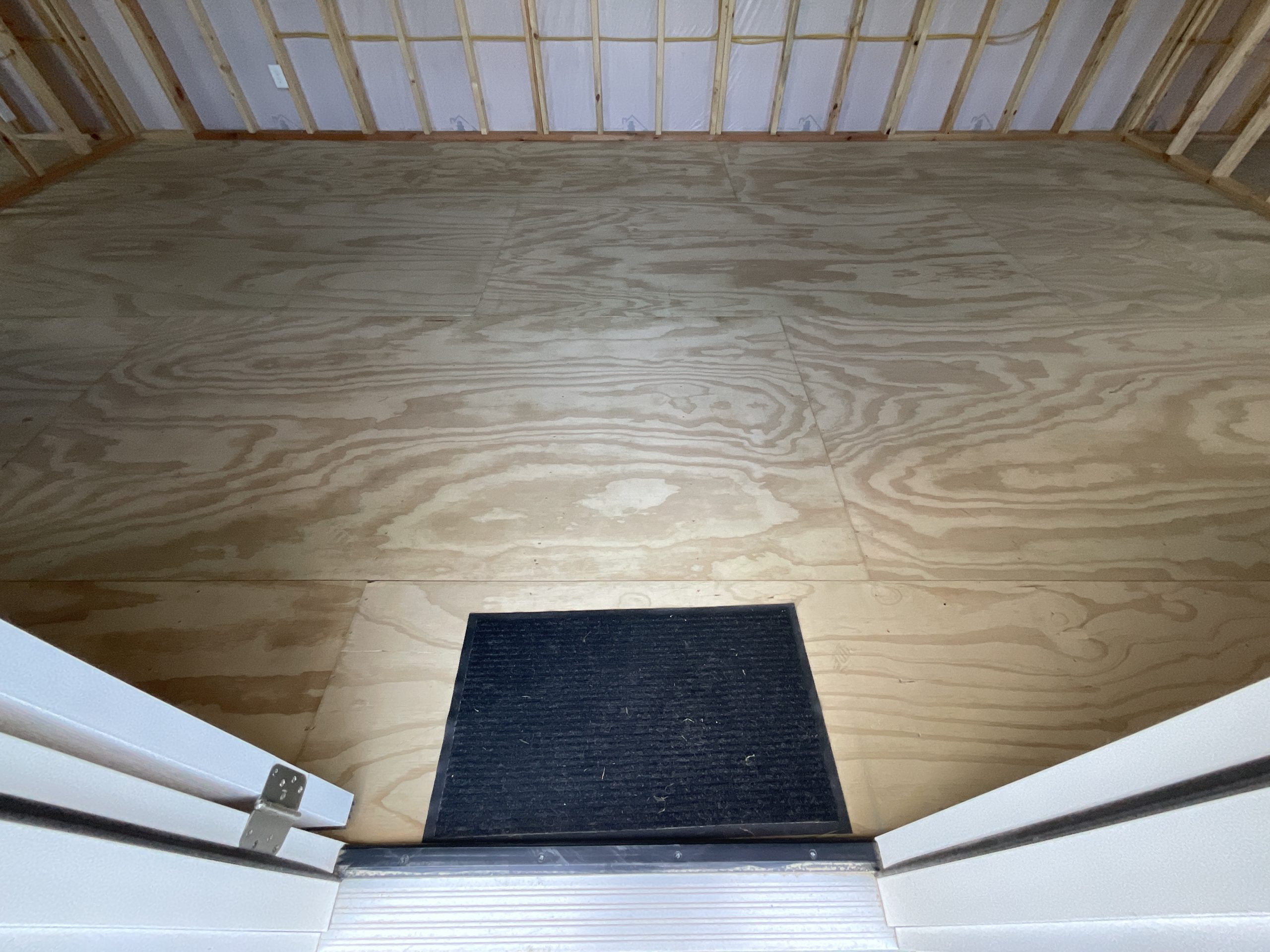 Real tongue and groove wood flooring inside House Shell
