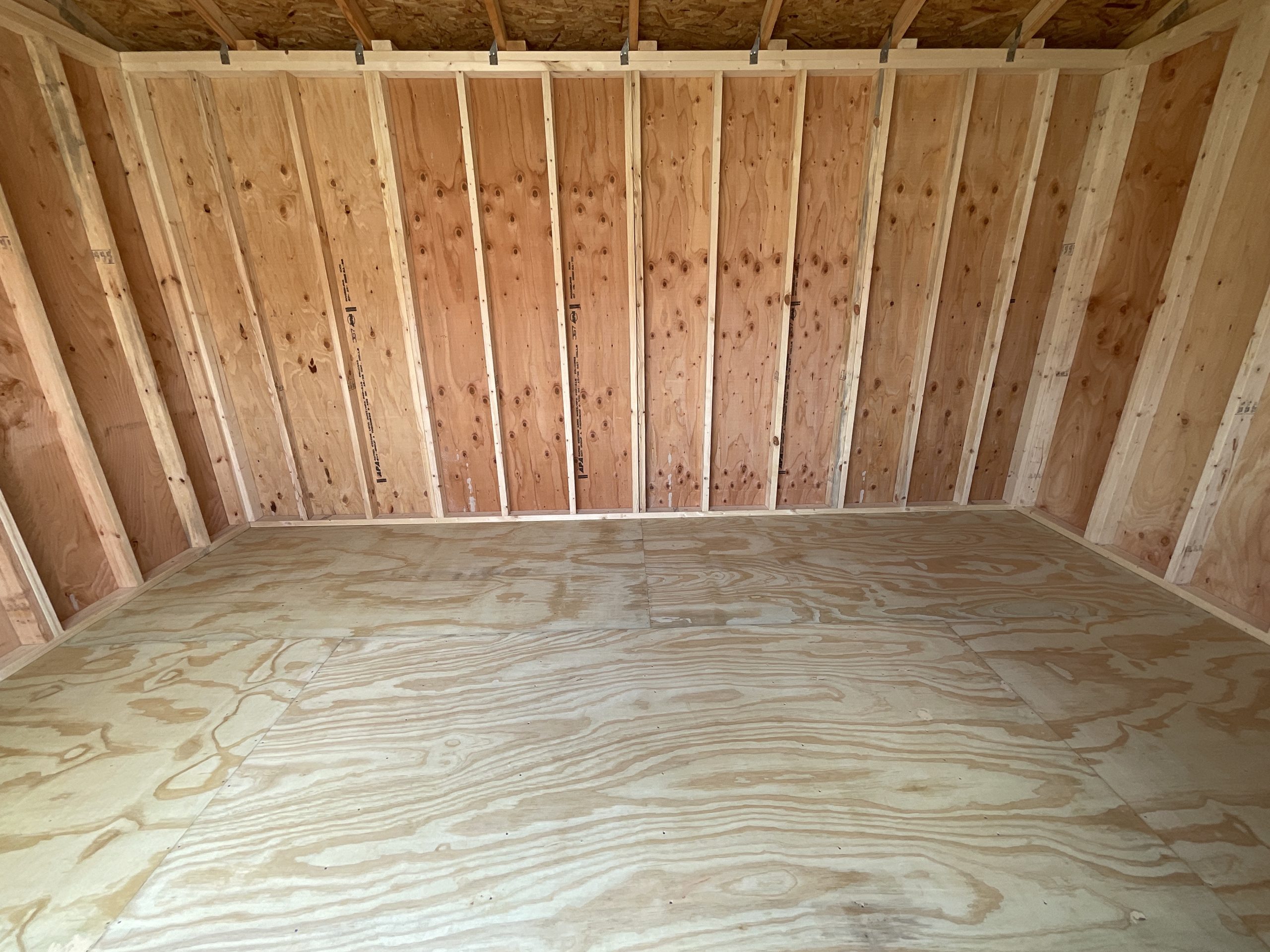 Real-wood flooring and real-wood siding inside DANCO storage building