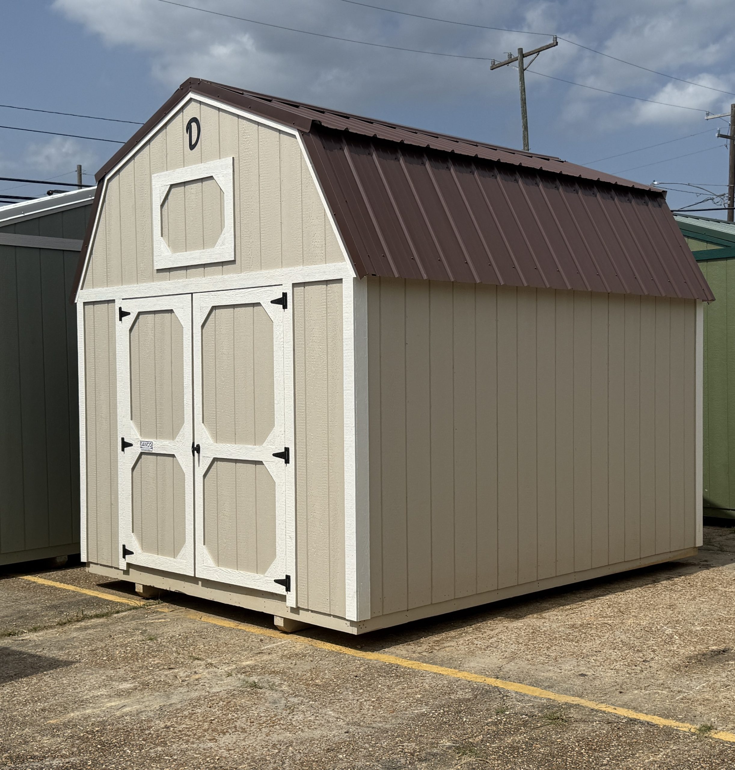 10x12 Lofted Barn mower storage building with brown metal roof Hammond LA