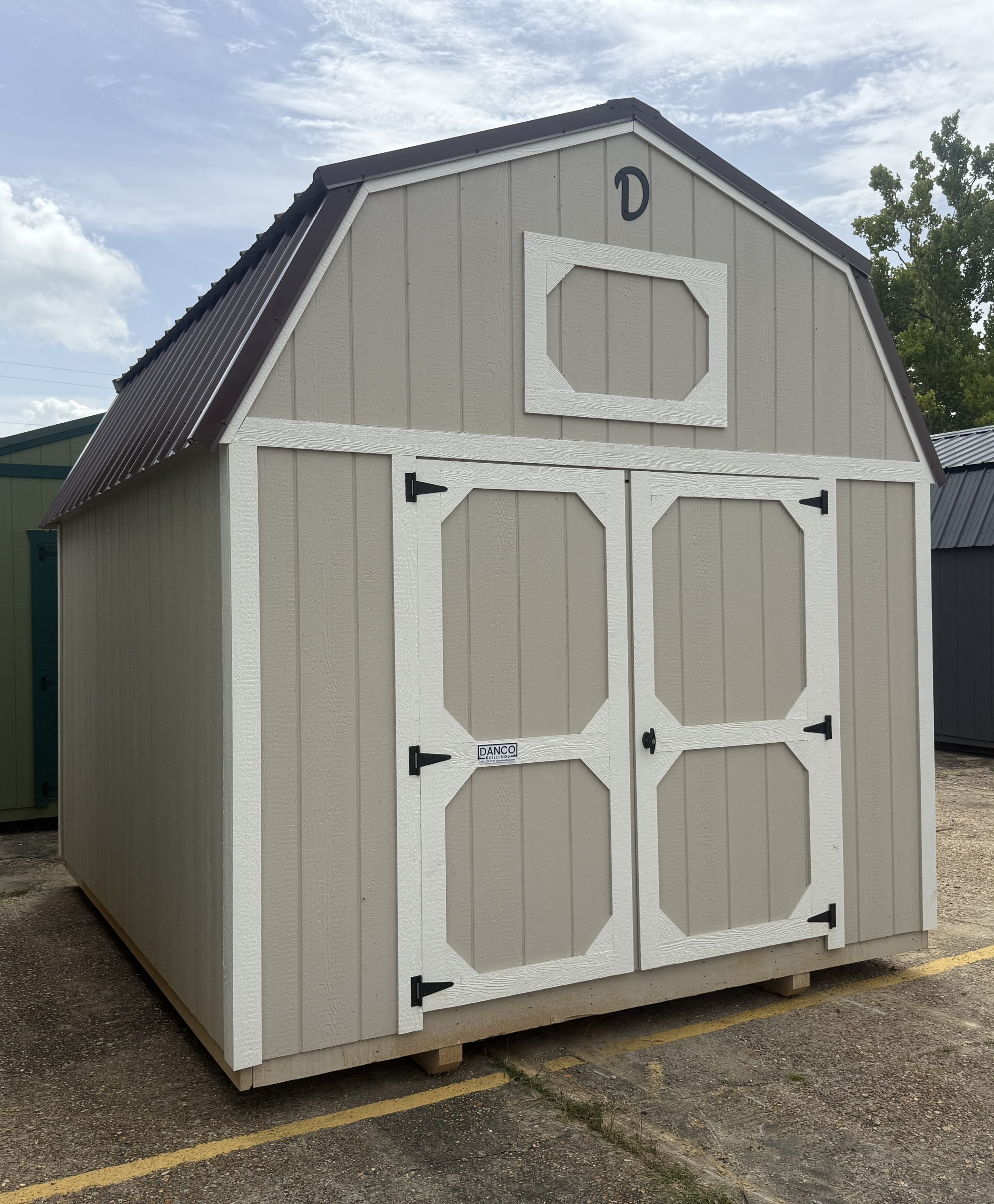 10x12 Lofted Barn portable storage building with double wood doors in Hammond Louisiana