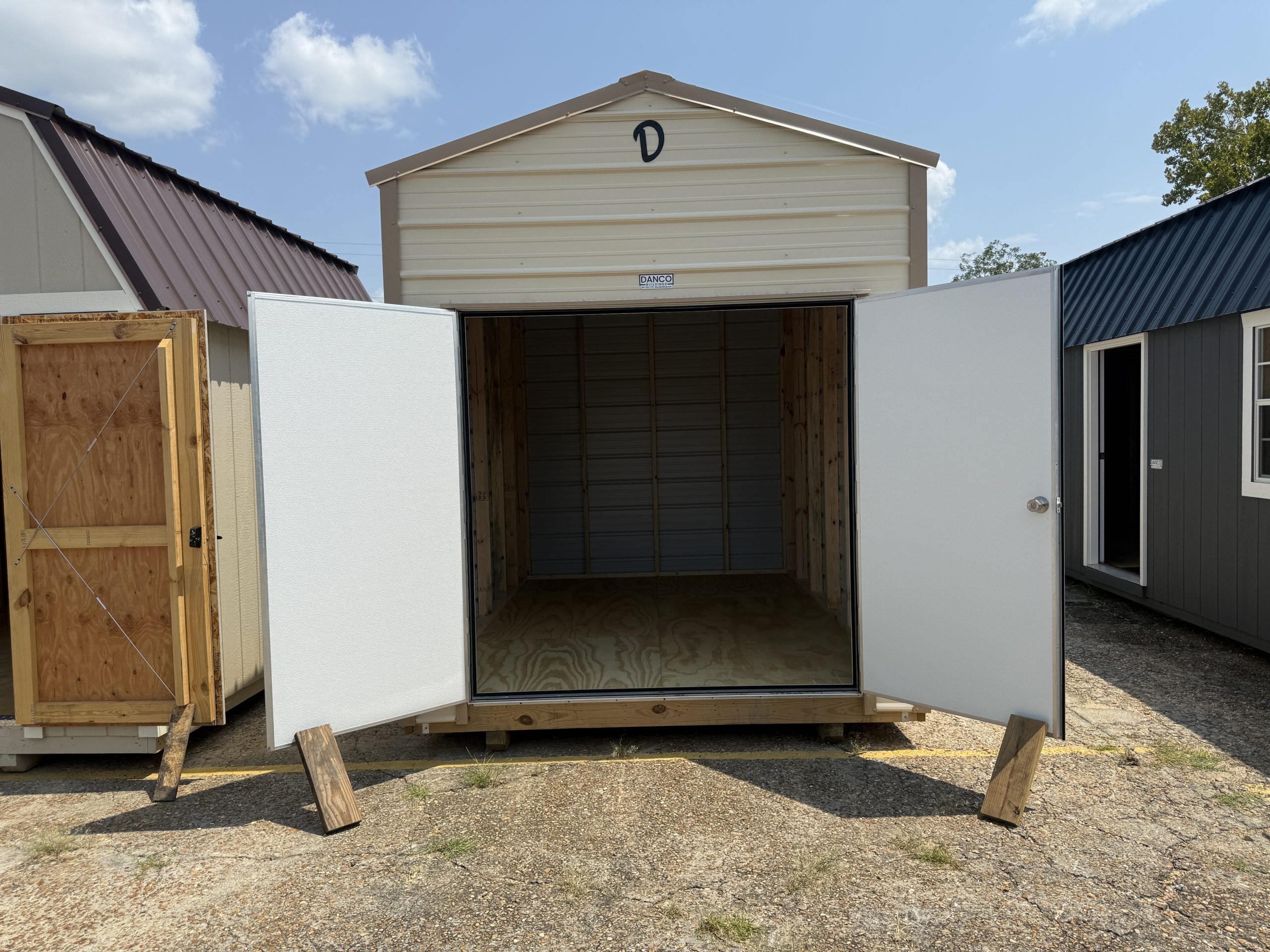 8x12 storage shed with double 3 foot doors open to create a 6 foot wide entrance
